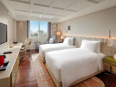 Habitación Executive Twin con acceso al salón executive - Planta alta - Hora diaria de chocolate de cortesía de 17:00 a 18:00 — Mövenpick Hotel Hanoi Centre